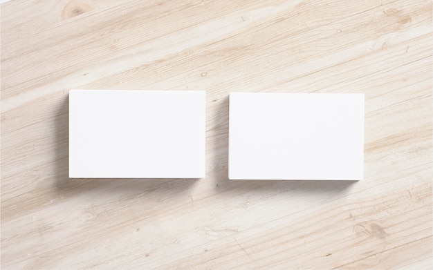 Black business cards stacks on wooden background