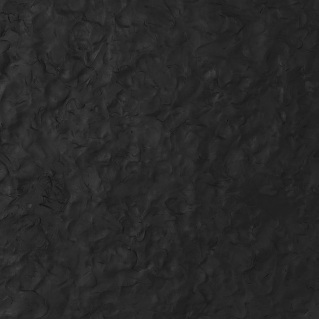 Black clay textured background in abstract DIY creative art minimal style