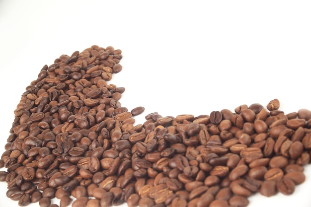 Black coffee beans on white backgroundphoto with copy space Premium Photo
