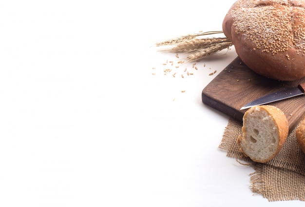 Black coffee and whole wheat bread for breakfast on white background