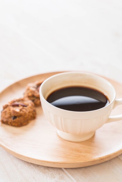 black coffee with cookies
