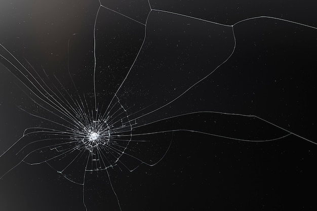 Black cracked background with broken glass texture