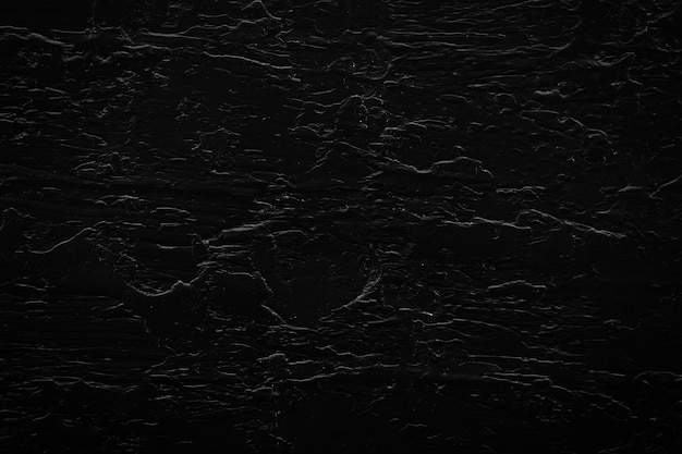 Black creased textured wall background