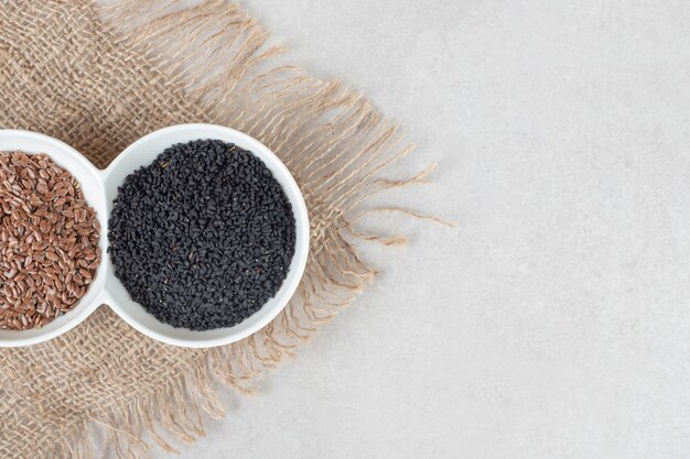 Black cumin spices isolated on concrete.