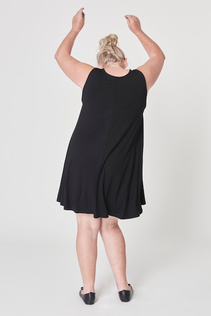 Free photo black dress plus size apparel body positivity