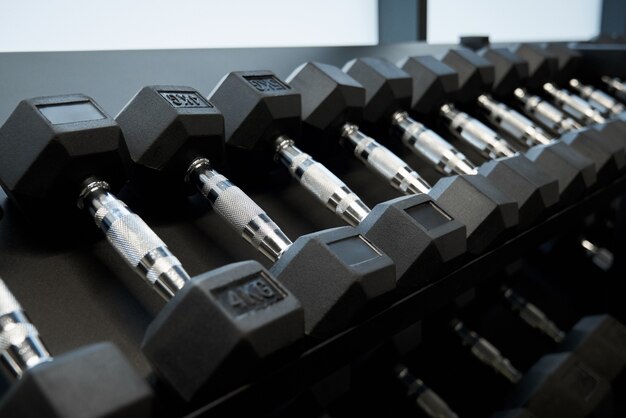 Black dumbbells with different weight