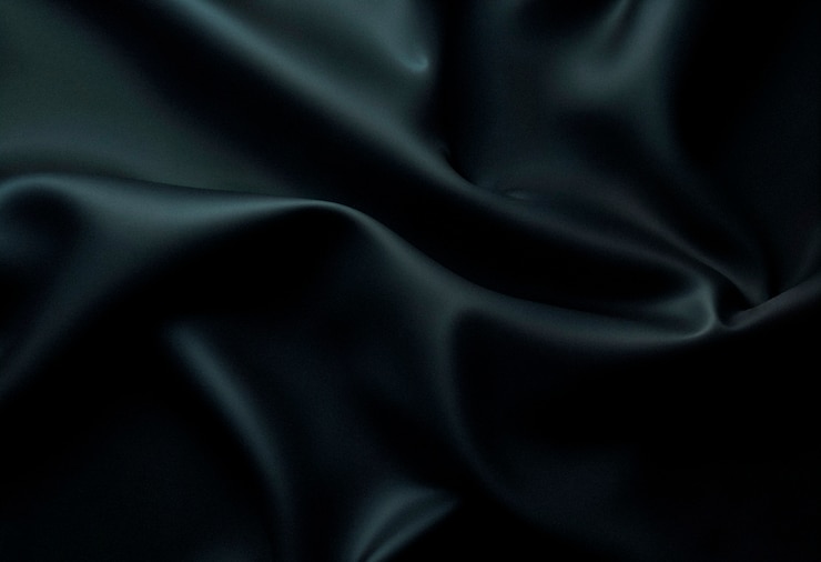 Free Photo black fabric with soft texture and draped appearance