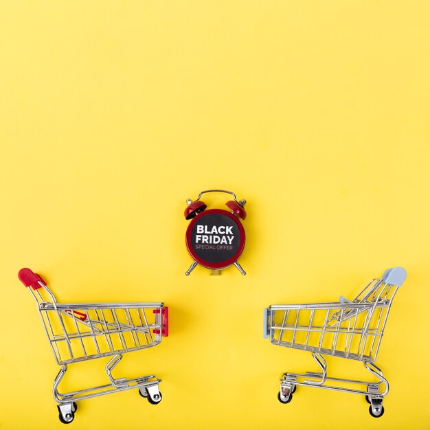 Black friday alarm clock with shopping carts