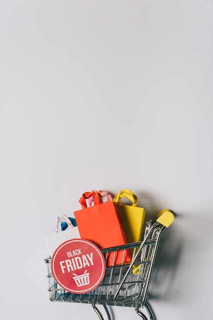 Black friday composition of bags in cart