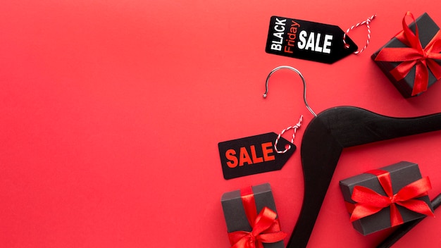 Black friday composition on red background with copy space