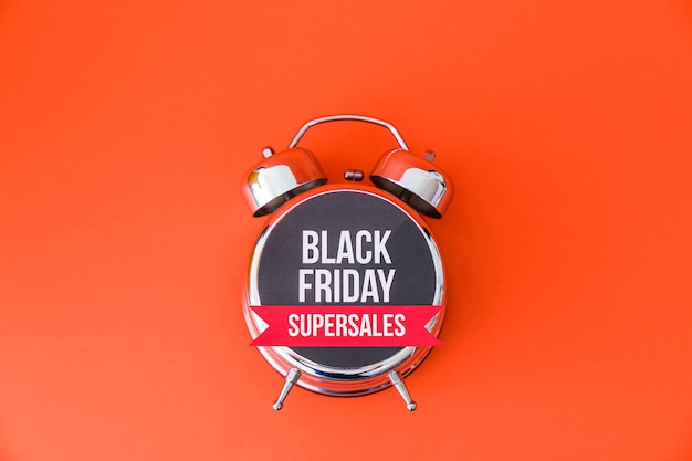 Free photo black friday concept with alarm clock