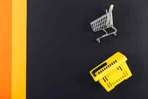Free photo black friday concept with cart and basket