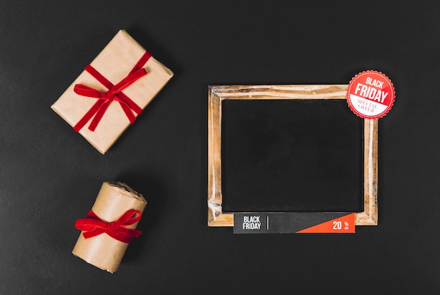 Black friday concept with slate and gift boxes