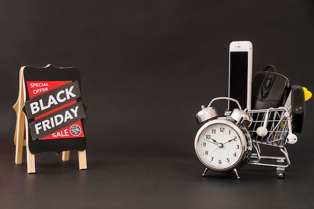 Free photo black friday concept with space in middle and alarm clock