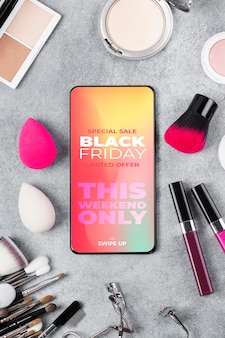 Black friday cosmetics sales arrangement with smartphone