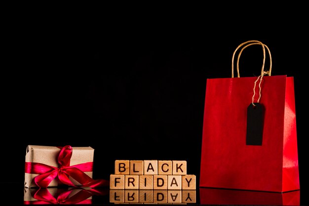 Black friday cubes with present and bag 