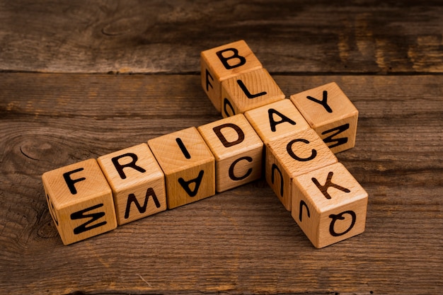 Black friday cubes on wooden background