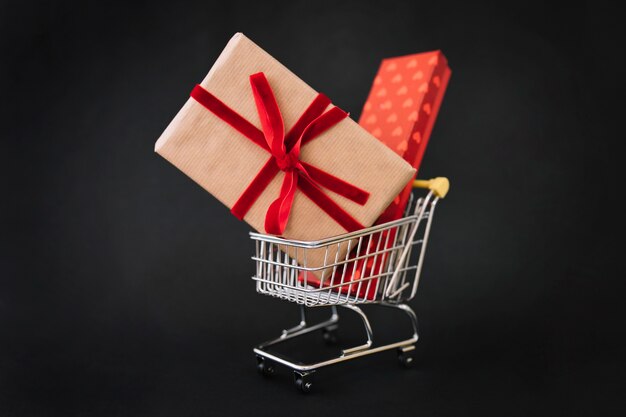 Black friday decoration with two gift boxen in cart