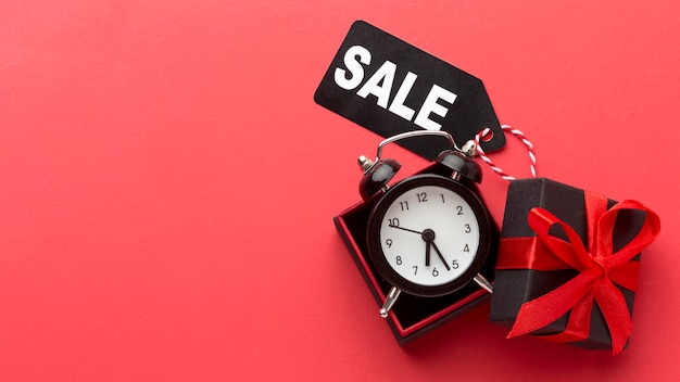 Free photo black friday elements composition on red background with copy space