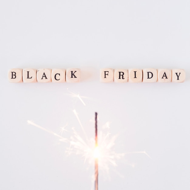 Black Friday inscription on cubes with Bengal fire 