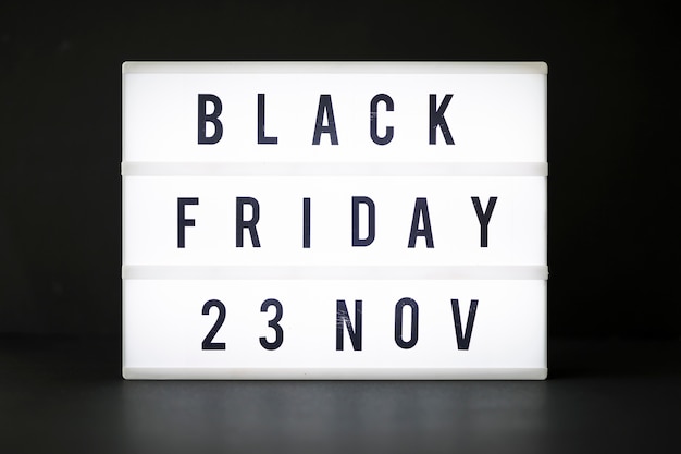 Free photo black friday inscription on light board