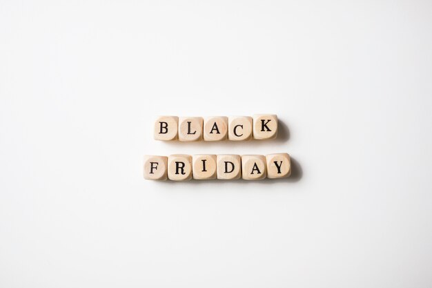 Black Friday inscription on small cubes on table 