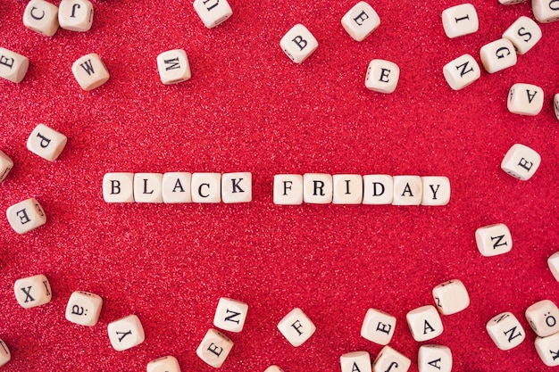 Free photo black friday inscription on small cubes on table