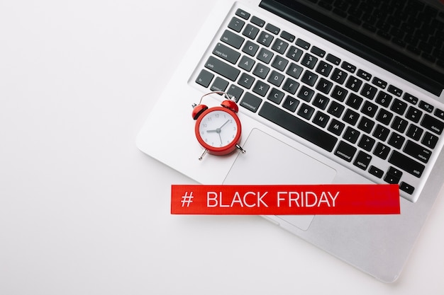 Free photo black friday laptop and clock sale