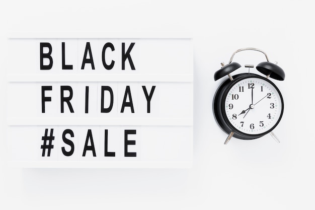 Black friday light box near alarm clock