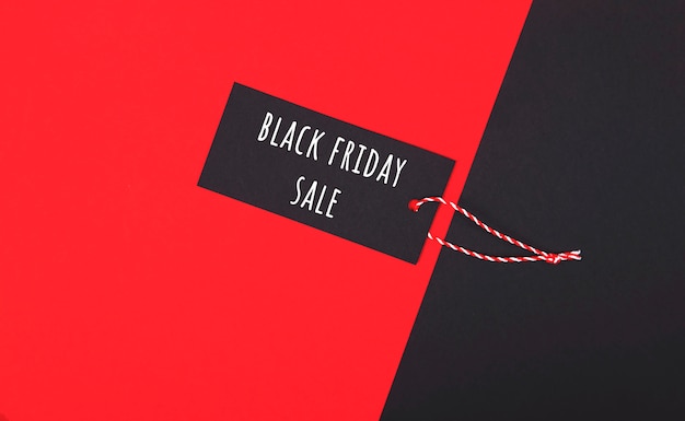 Black friday sale tag. dark label on red.