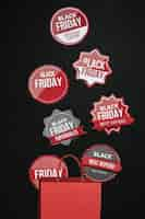 Free photo black friday stickers and red paper bag