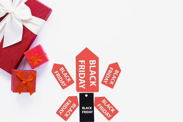 Free photo black friday tag and stickers near gifts