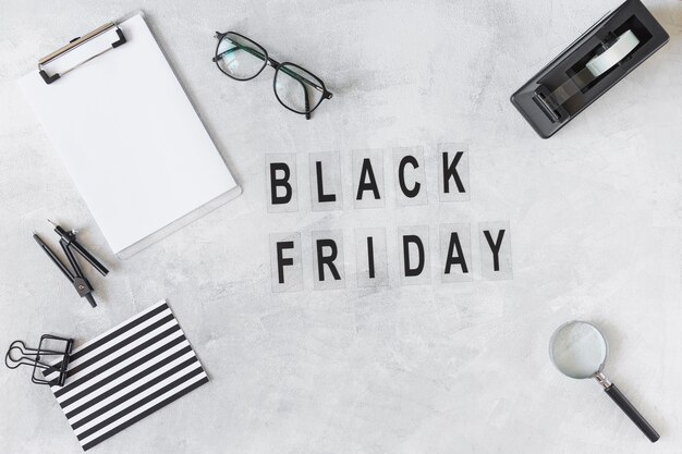 Black Friday title near different stationery