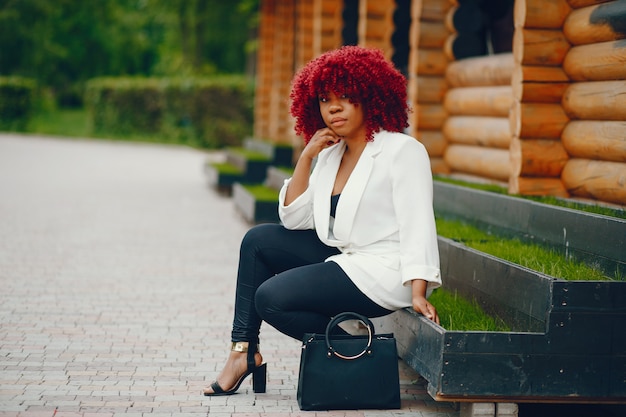 Black girl in a summer park