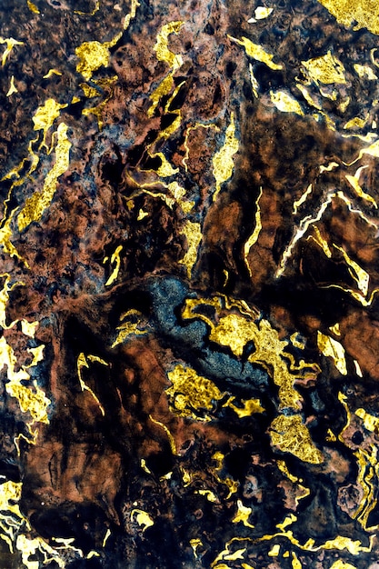 Черный и золотой мрамор текстурированный фон
