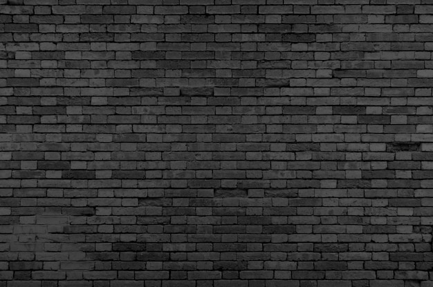 Free photo black grunge brick wall background