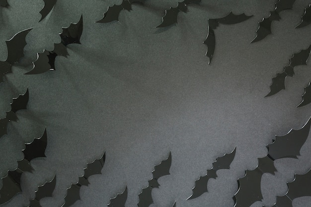 Black Halloween bats laid in circle