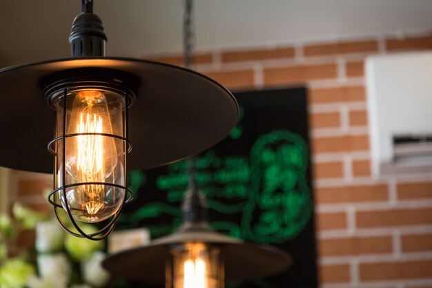 Black lamp with light bulb