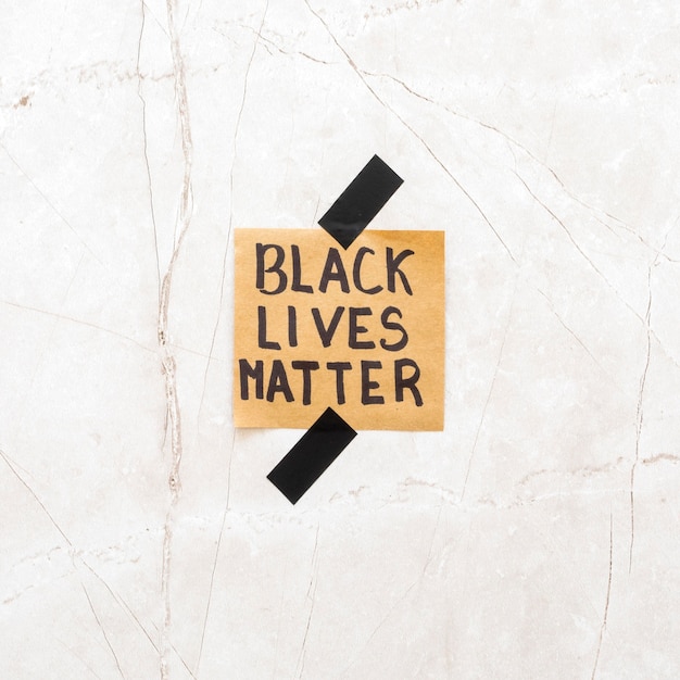 Free photo black lives matter with on cement surface