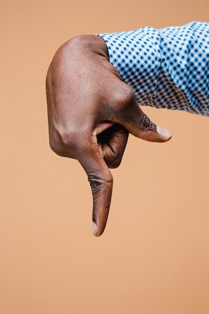 Black male hand point finger. Hand gestures - man pointing on virtual object with forefinger