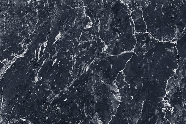 Free photo black marble textured background design