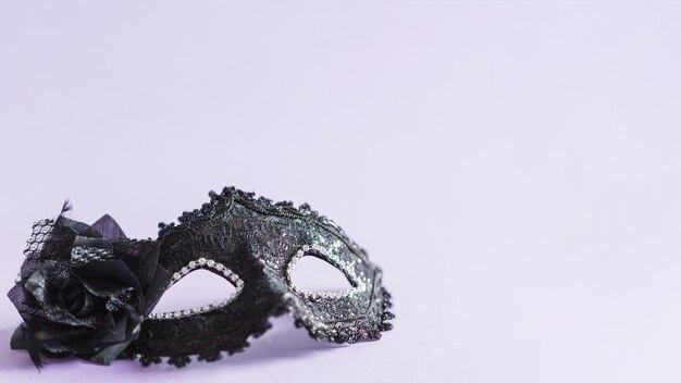 Black mask with flower