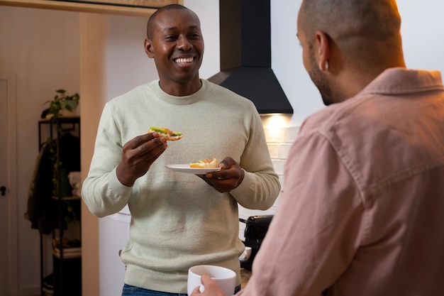Free photo black men couple spending time together