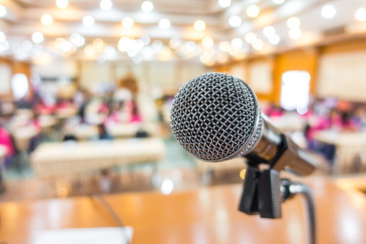 Free Photo black microphone in conference room .