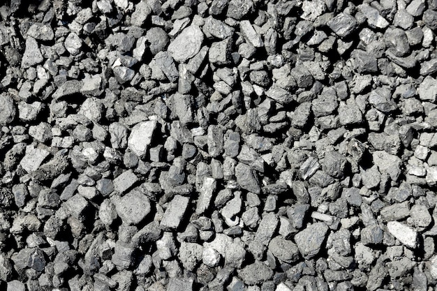 黒​鉱物​炭​、​石​の​背景​。​黒炭​の​質感​。​スペース​を​コピーします​。​高​品質​の​写真