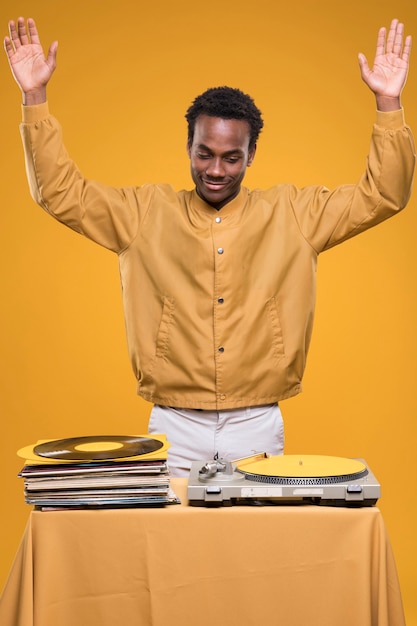 Black model posing with vinyls