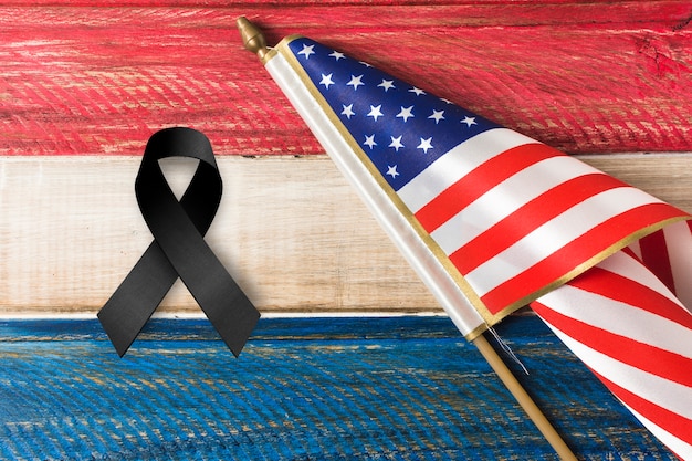 Free photo black mourning ribbon with american flag