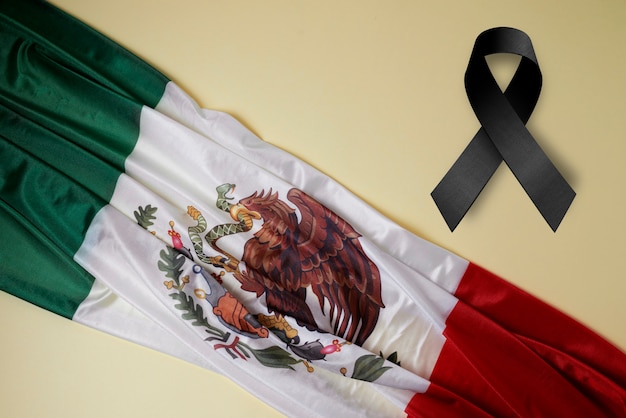 Free photo black mourning ribbon with mexican flag