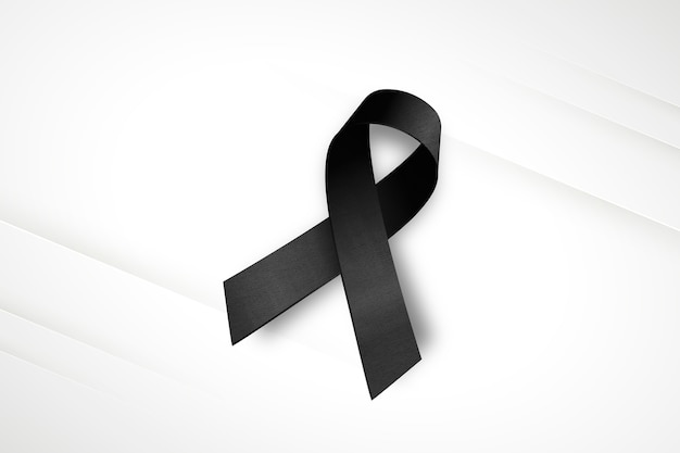 Free photo black mourning ribbon with white background