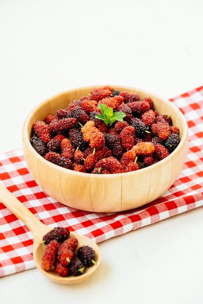 Black mulberry fruit in bowl